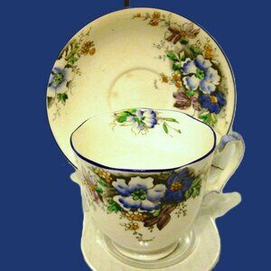 Blue and white flowers, green & brown greenery, Melba bone china cup and saucer